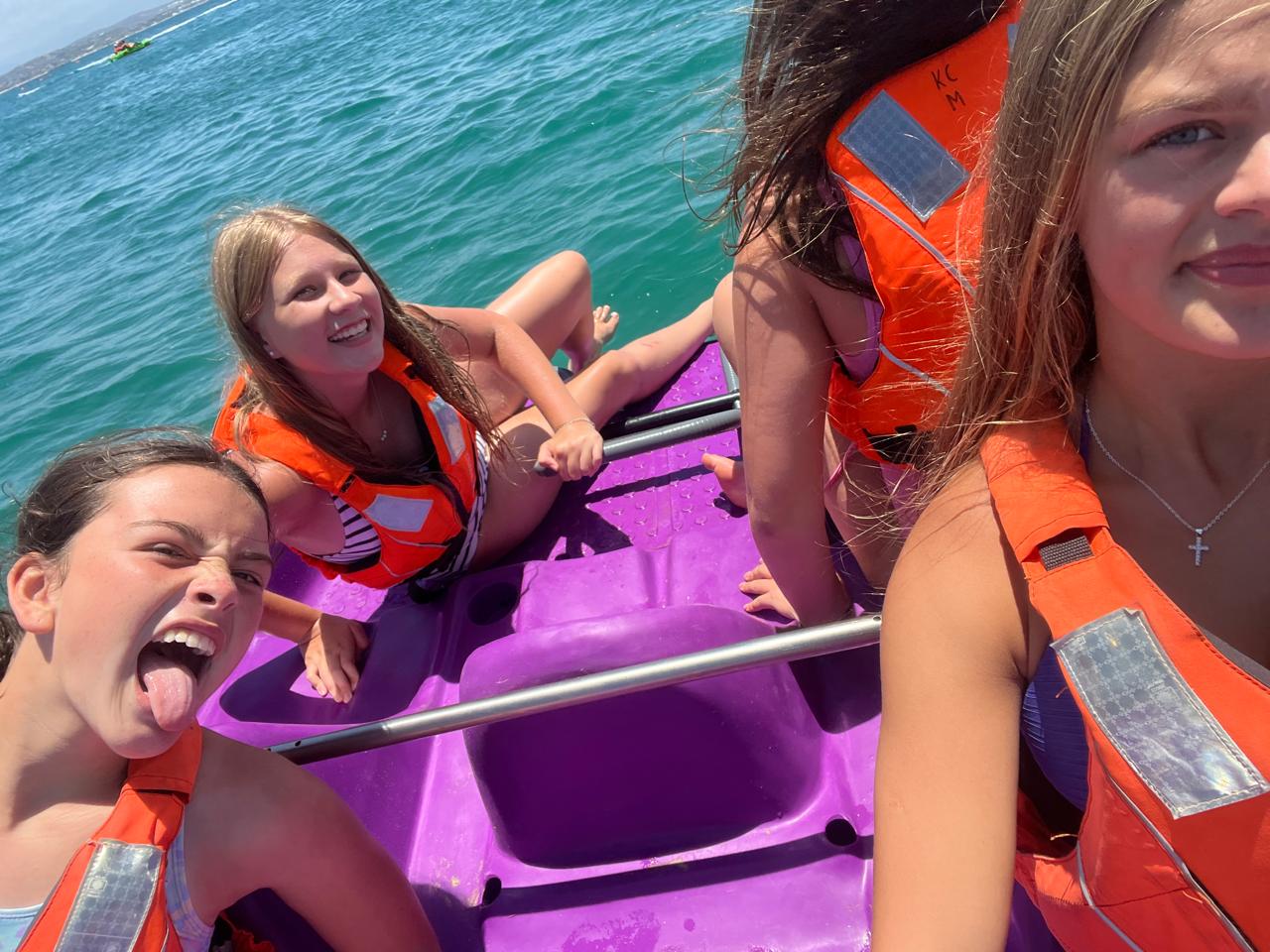 Happy customers on pedal boats